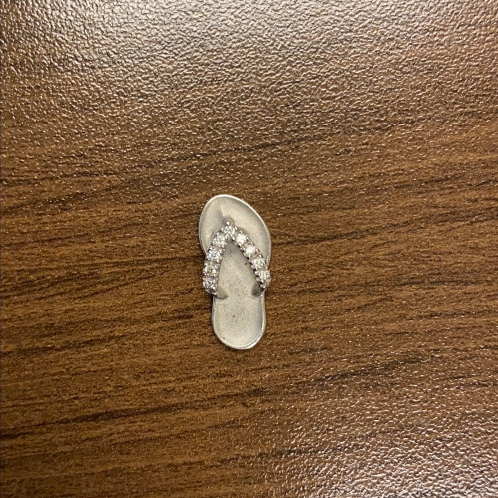 14k white gold and diamond pendant.